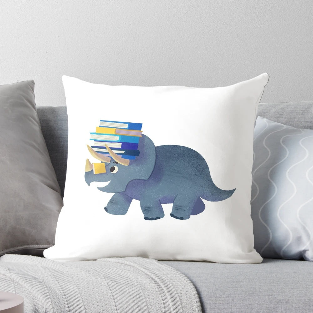 Soft, plush pillow featuring a cute dinosaur design, perfect for reading and bedroom decor.
