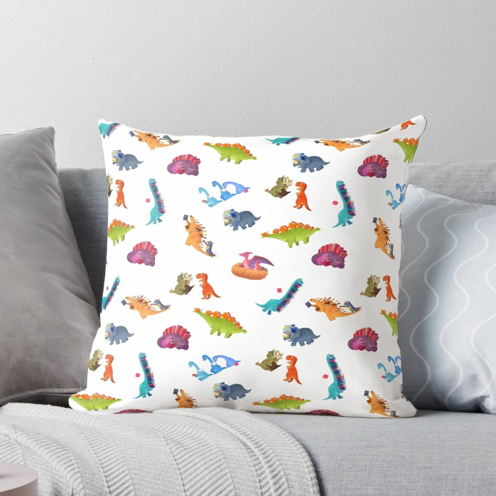 Soft, plush pillow featuring a vibrant dinosaur book design, perfect for kids' rooms and home decor.
