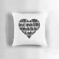 A cozy plush pillow with a heart-shaped book design for book lovers and reading enthusiasts.