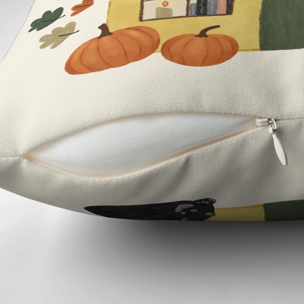 Cozy pumpkin and black cat decorative pillow for book lovers