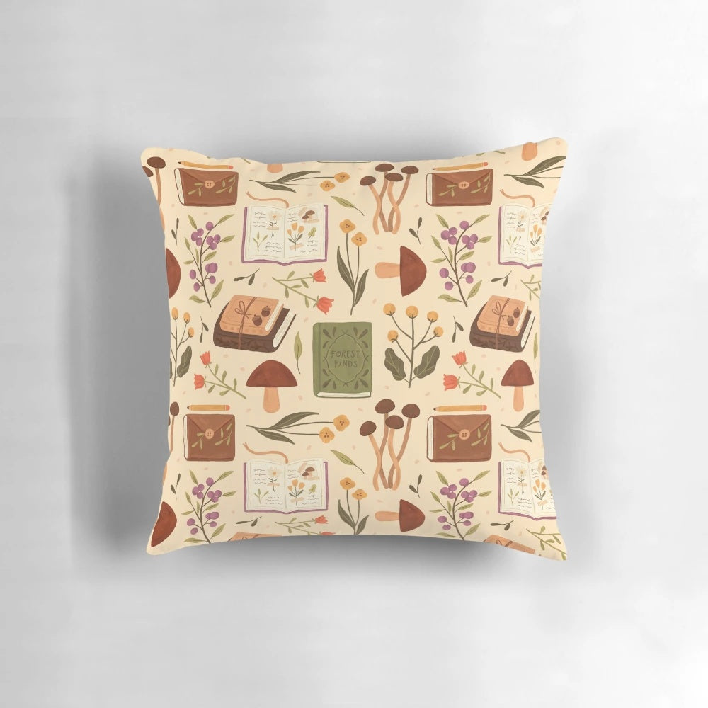 Decorative forest-themed throw pillow with illustrated mushrooms, flowers, and books