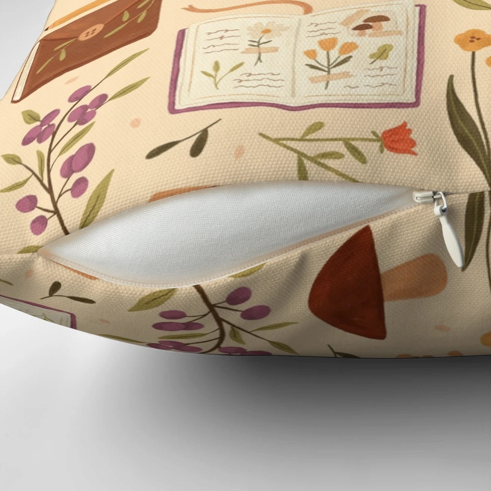 Decorative forest-themed throw pillow with illustrated mushrooms, flowers, and books