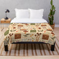 Plush blanket with a bookish forest and botanical pattern