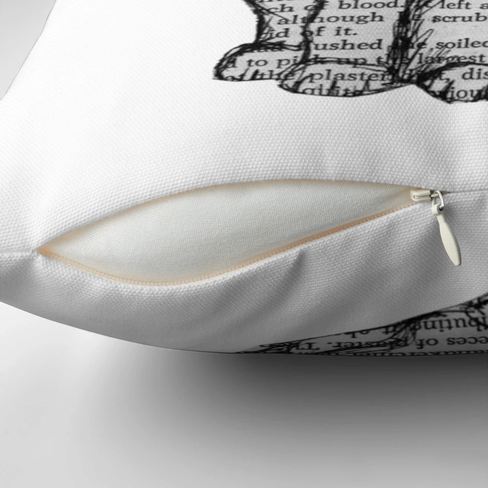 A plush pillow featuring a playful design with books and cats, perfect for book lovers and pet owners.