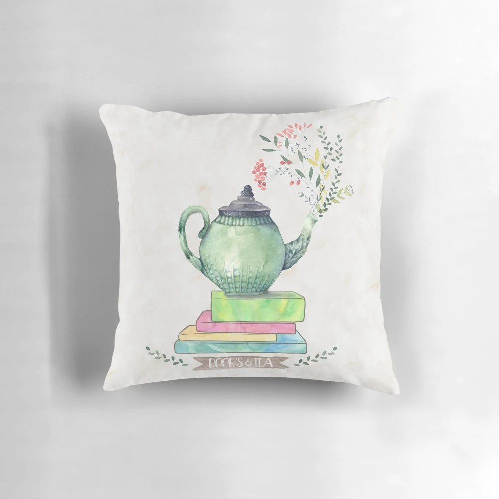 Watercolor painting of a stack of books and a teacup on a pastel pillow