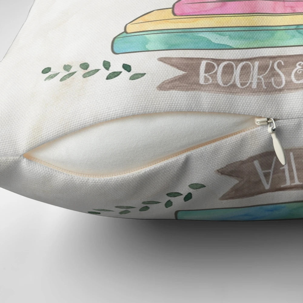 Watercolor painting of a stack of books and a teacup on a pastel pillow