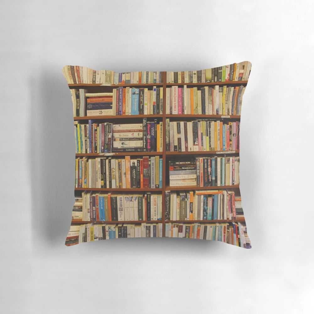 A plush, decorative pillow with a vintage books design, perfect for book lovers and creating a cozy reading nook.