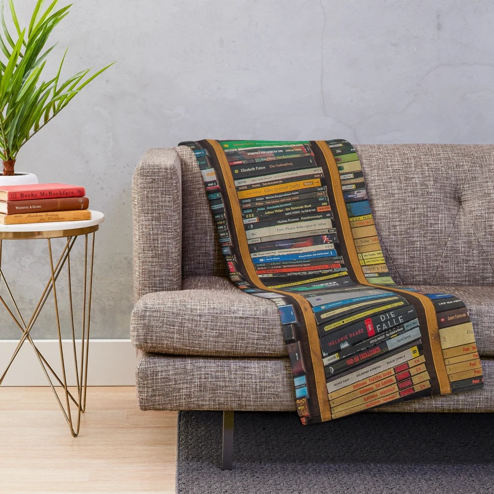 Cozy bookshelf-themed patterned plush blanket for book lovers