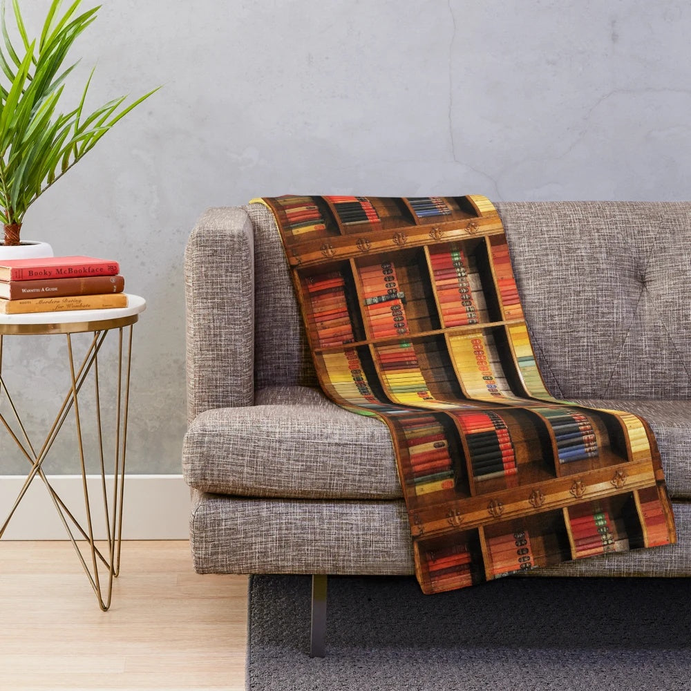 Plush blanket with a bookshelf design for book lovers