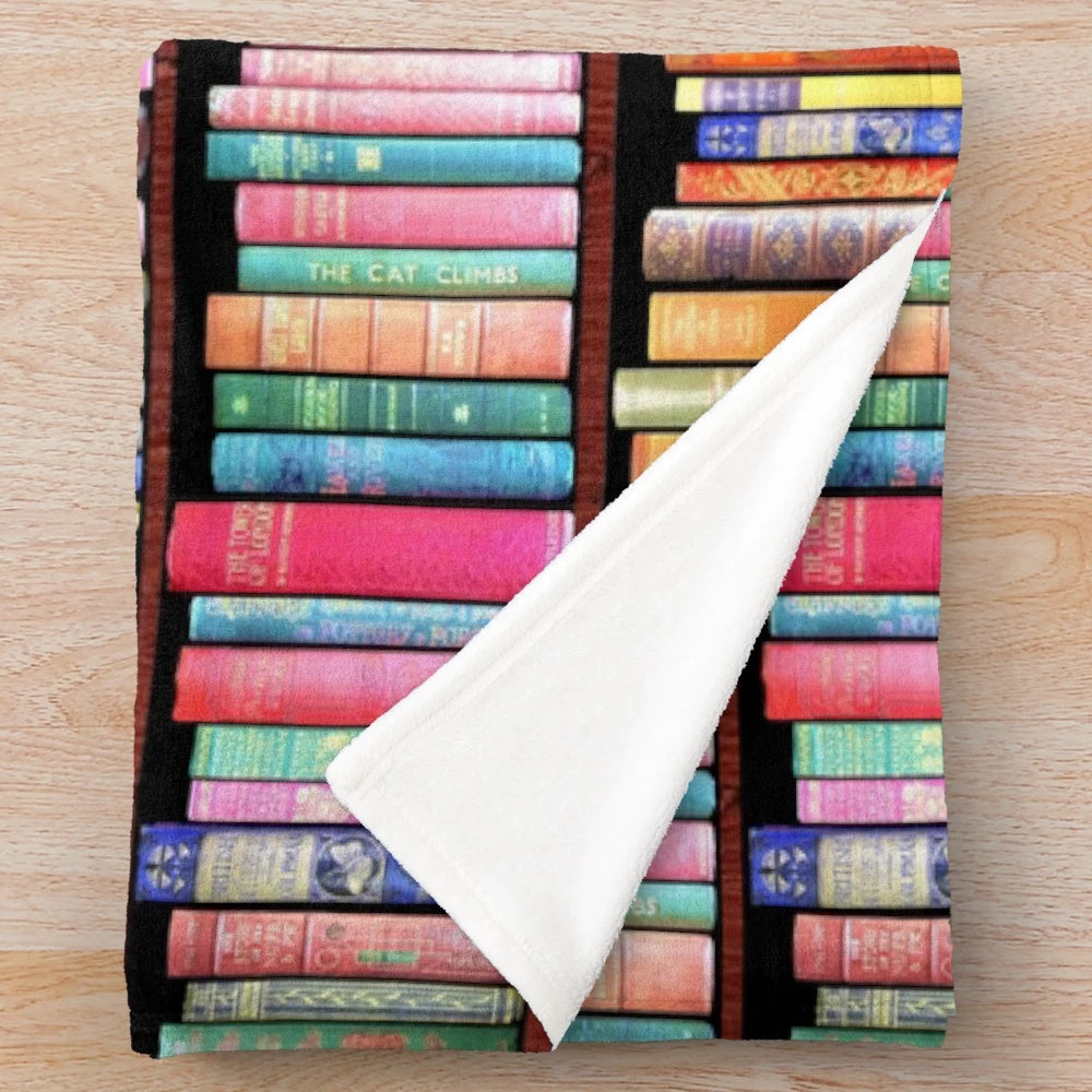 Plush blanket with vintage book and bookshelf design for book lovers