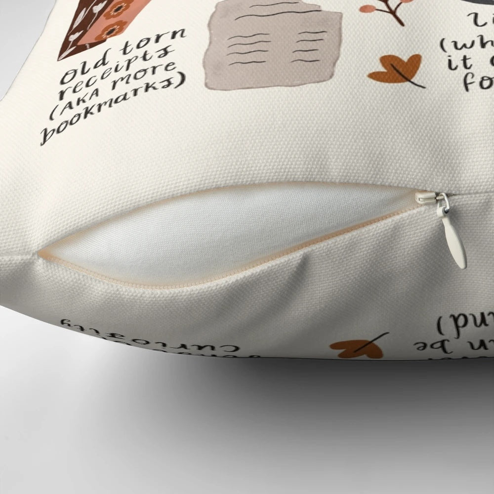 A whimsical pillow featuring a stack of books, perfect for book lovers and bookworms