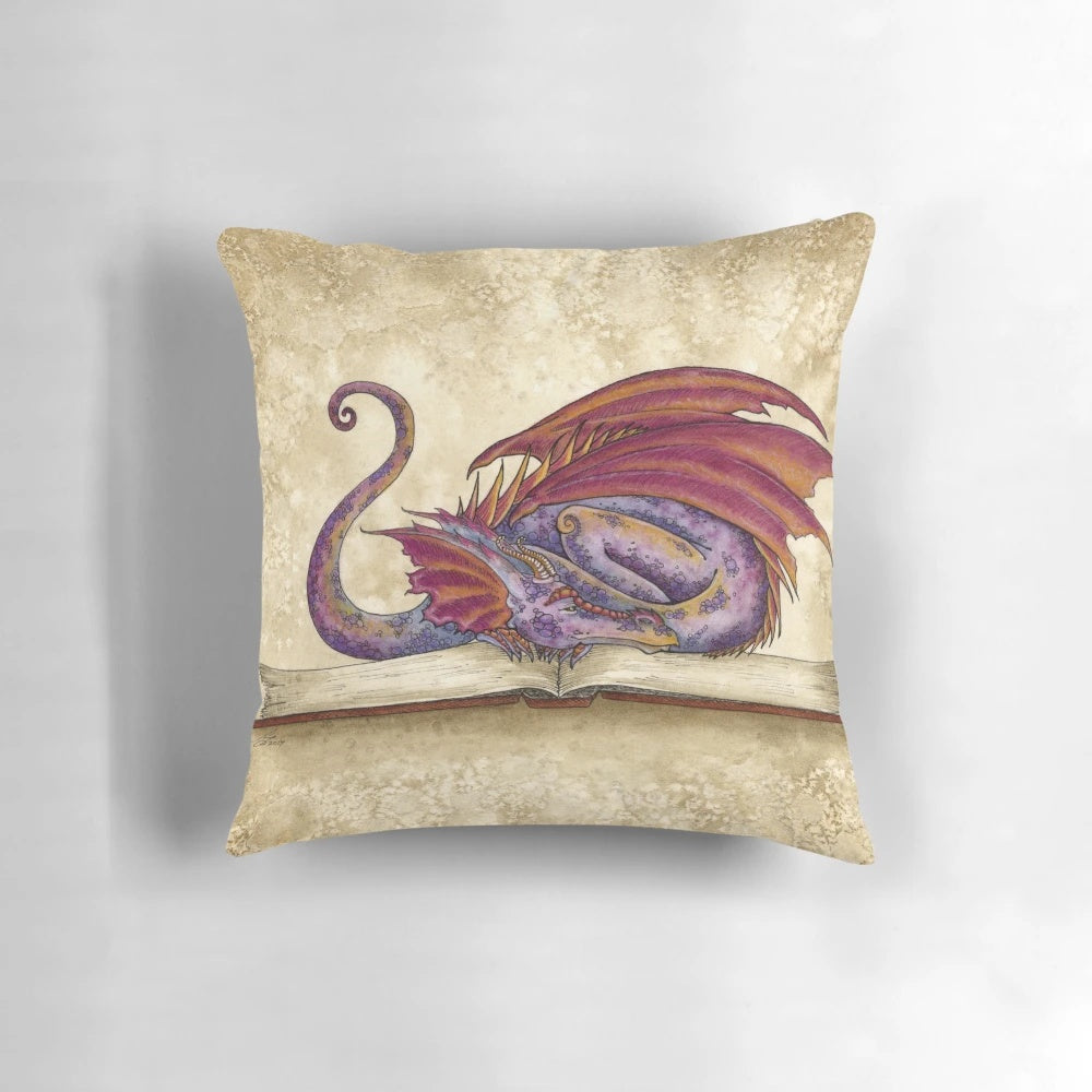 Red and purple dragon-themed pillow with a bookworm design, perfect for reading and studying.