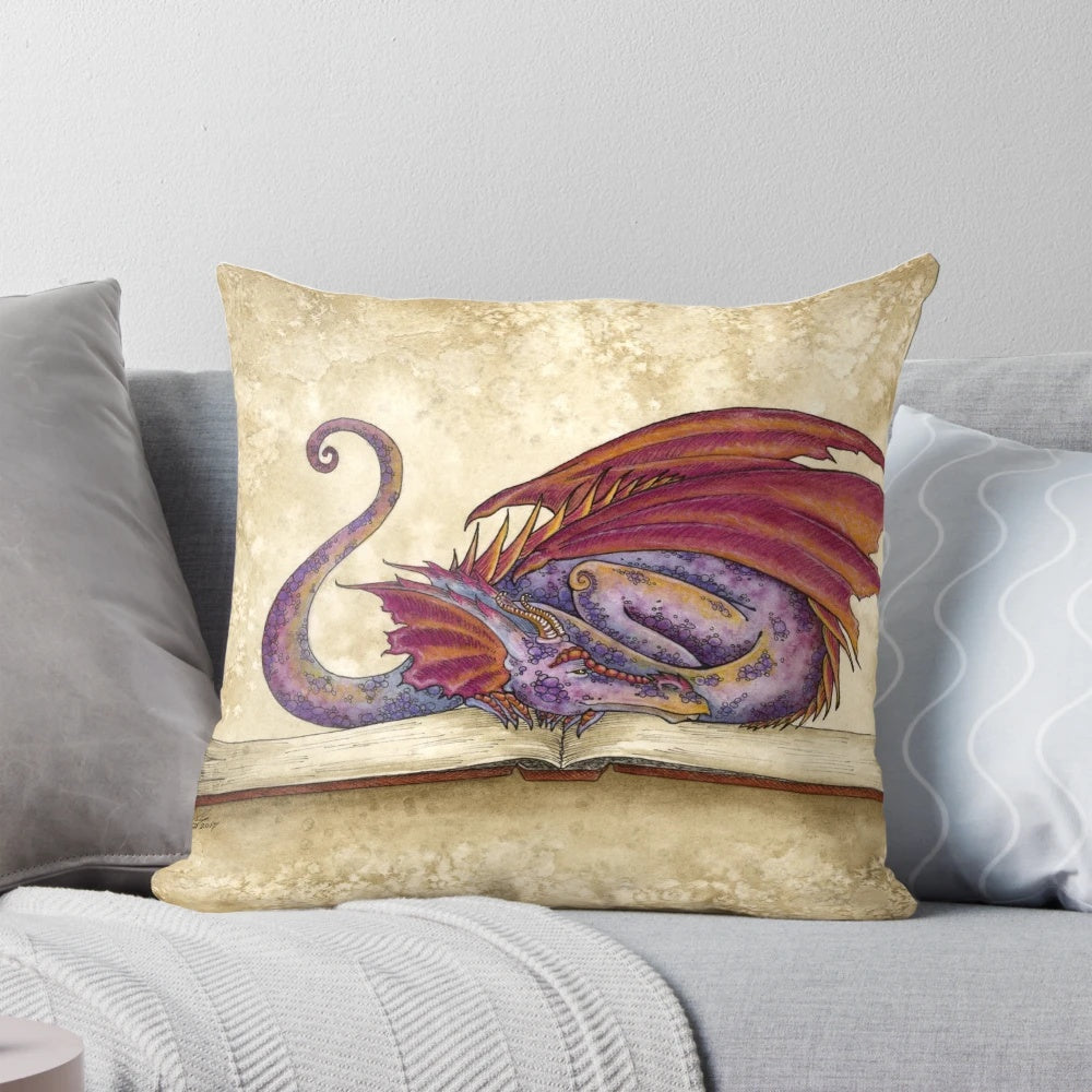 Red and purple dragon-themed pillow with a bookworm design, perfect for reading and studying.