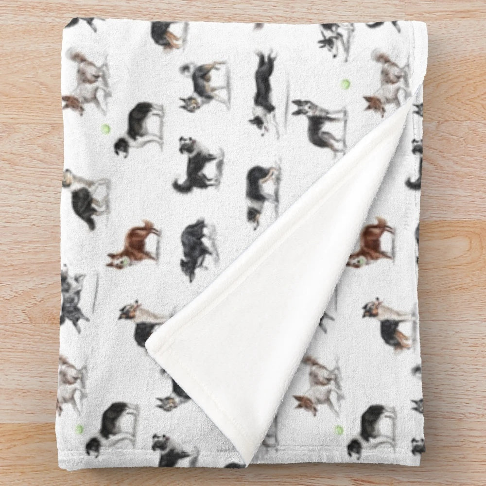 A soft, plush blanket featuring the image of a border collie dog
