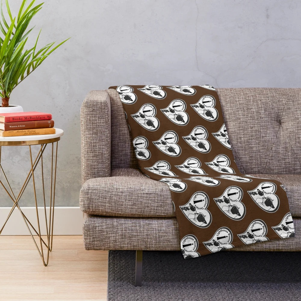 Brown-colored Boston Terrier plush blanket with lighthouse designs
