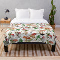 Cozy plush blanket featuring a botanical garden design with mushroom pattern