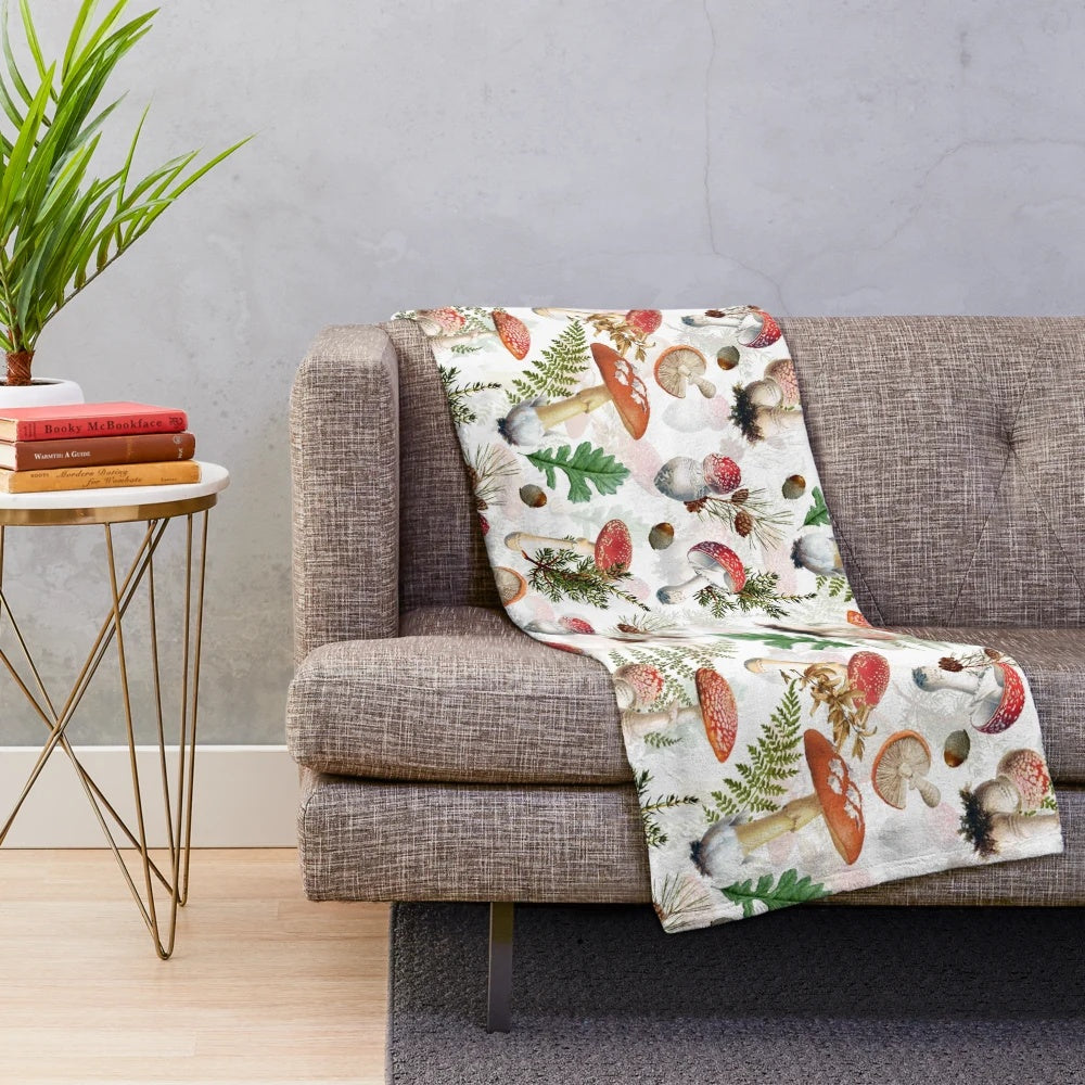 Cozy plush blanket featuring a botanical garden design with mushroom pattern