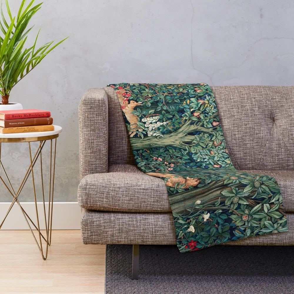 Soft and warm plush blanket featuring a vintage-inspired botanical design with forest animals like foxes and hares