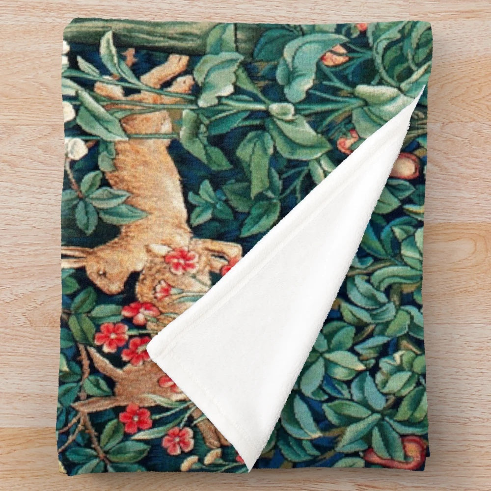 Soft and warm plush blanket featuring a vintage-inspired botanical design with forest animals like foxes and hares