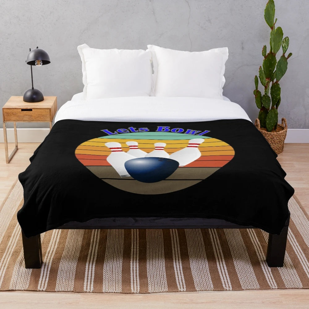 Bowling plush blanket with retro bowling ball design