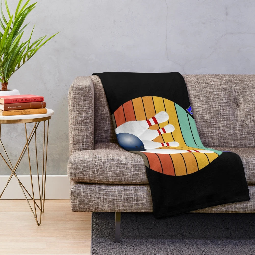 Bowling plush blanket with retro bowling ball design