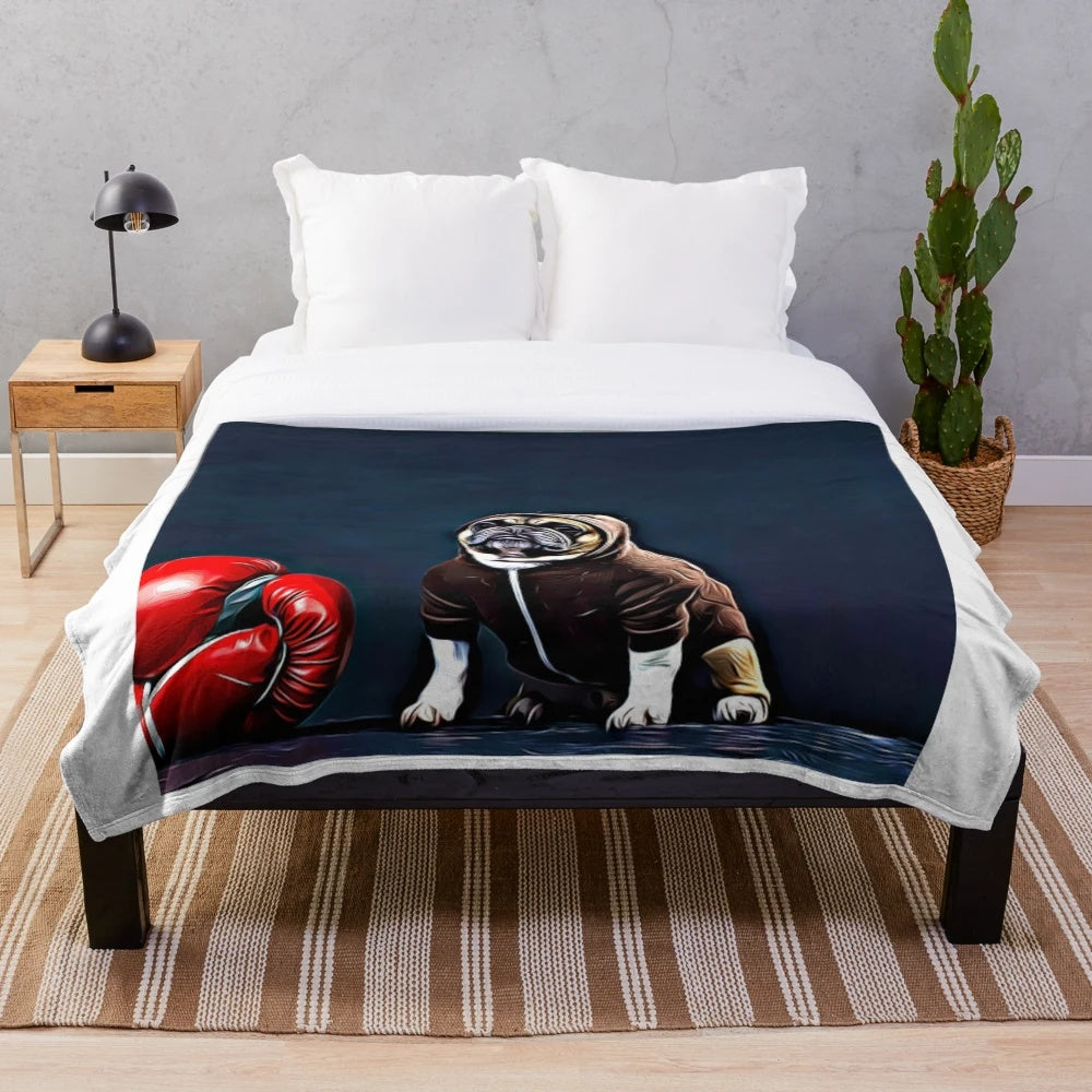 Boxer-inspired plush blanket with dog, fighter, and boxing glove design
