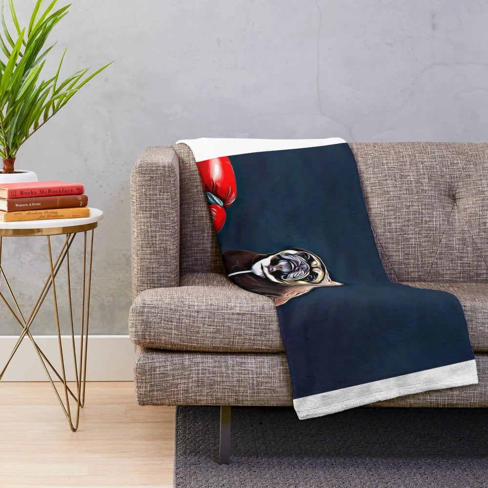 Boxer-inspired plush blanket with dog, fighter, and boxing glove design