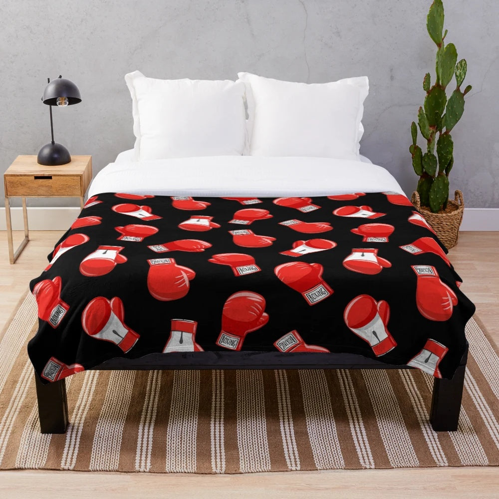 Red boxing gloves plush blanket with a little arrow design