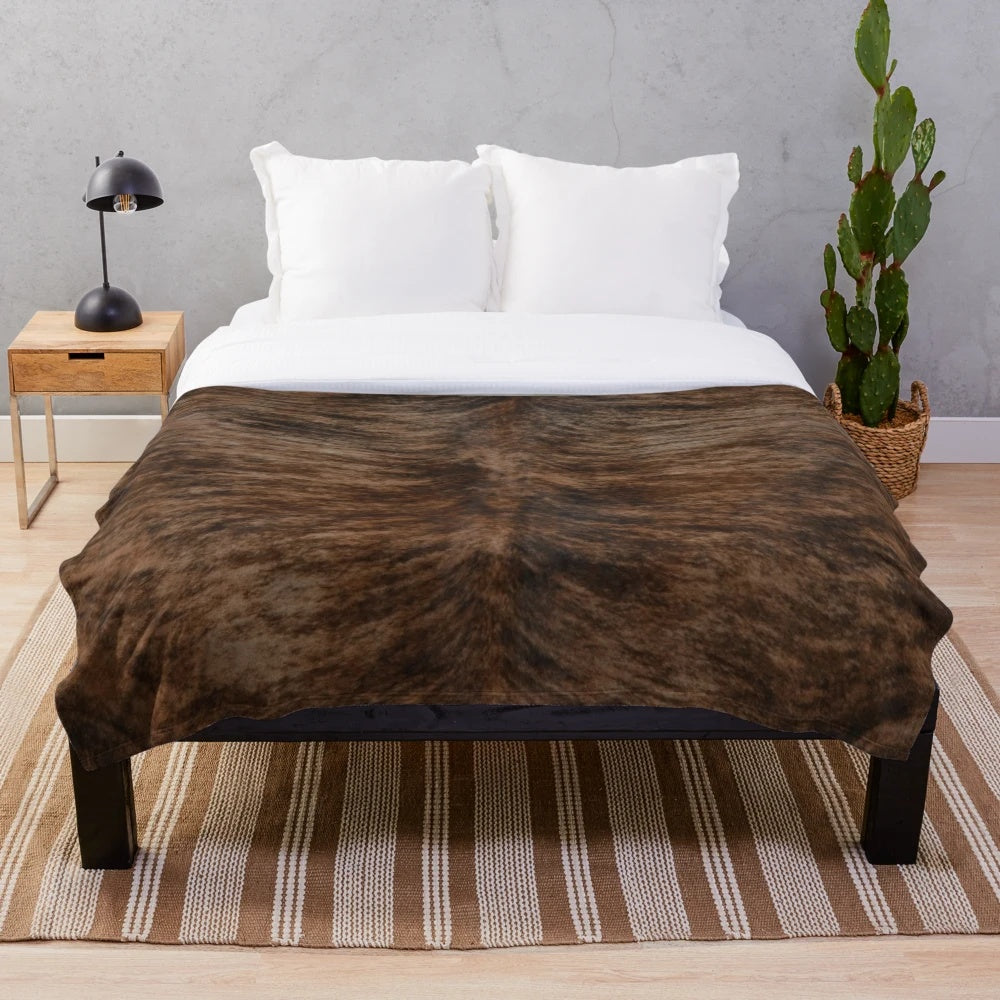 Brindle plush blanket with a soft, fuzzy texture and warm feel