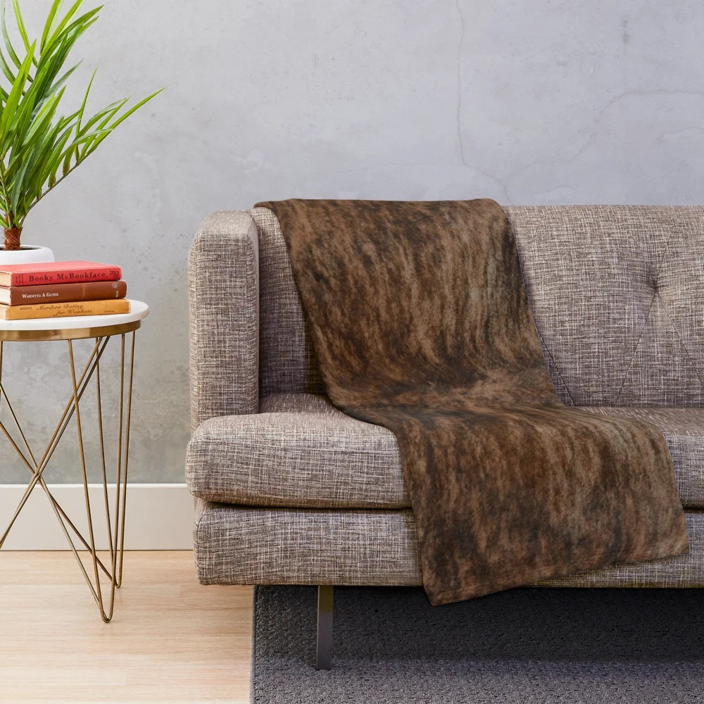 Brindle plush blanket with a soft, fuzzy texture and warm feel