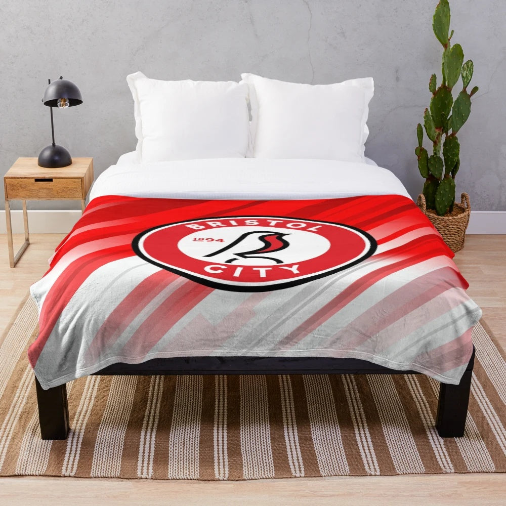 Plush blanket featuring the colors and design of Bristol FC, the English football club