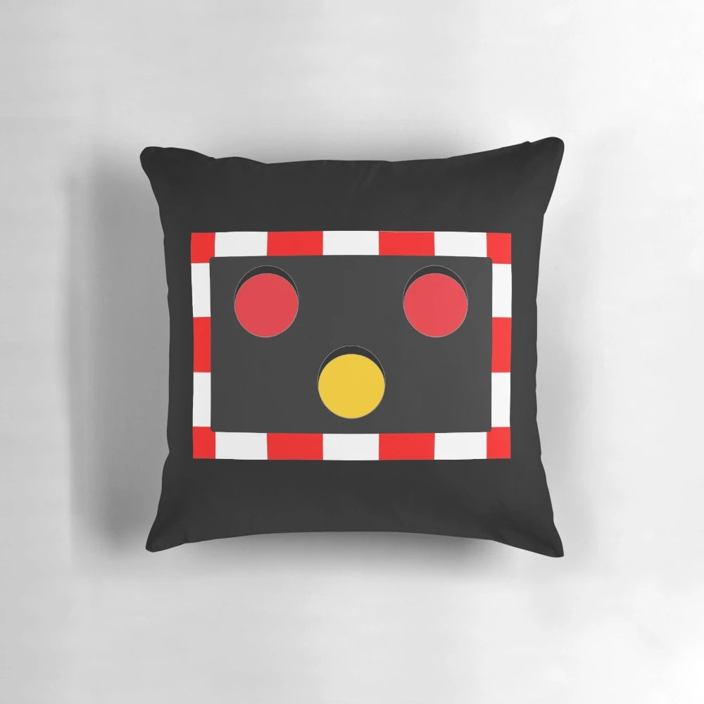 Plush pillow with an illustration of a British railway level crossing light, perfect for train lovers.