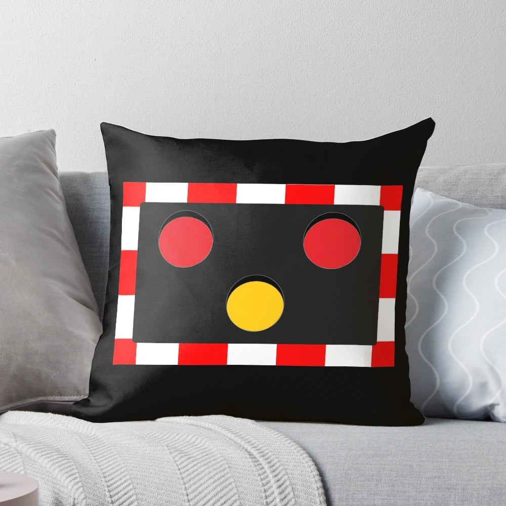 Plush pillow with an illustration of a British railway level crossing light, perfect for train lovers.