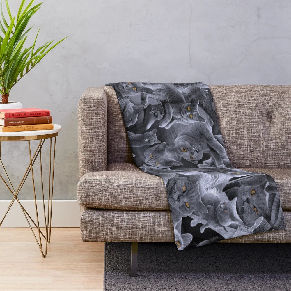 Soft and cuddly plush blanket featuring a collage of British Shorthair cats