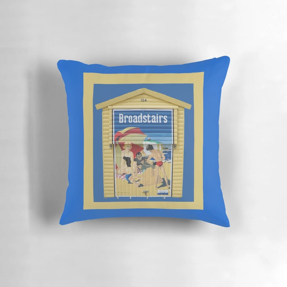 Broadstairs Beach Hut Pillow, a vibrant coastal home accent featuring a charming beach hut design.