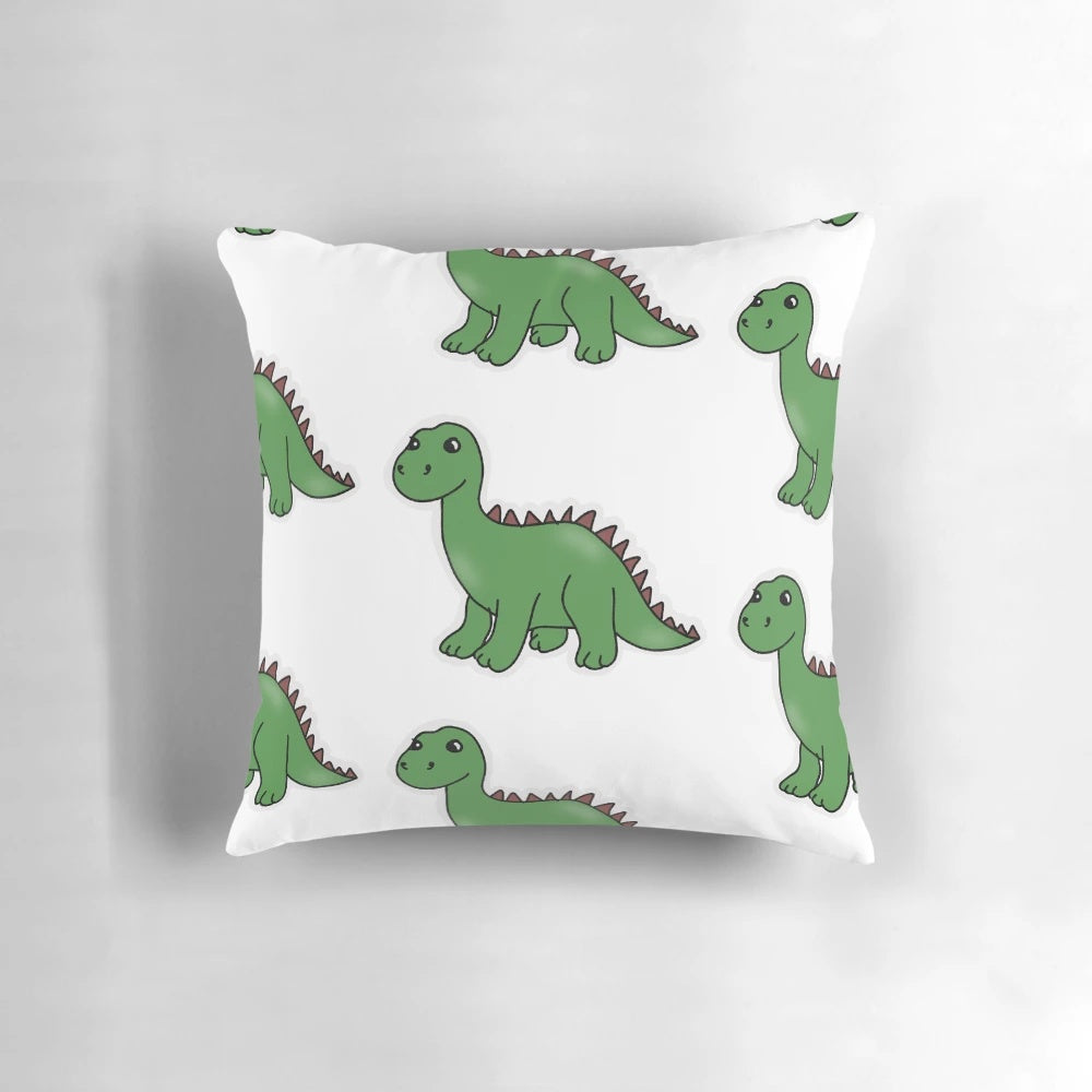 Soft and plush pillow featuring a cute brontosaurus dinosaur pattern in shades of green.