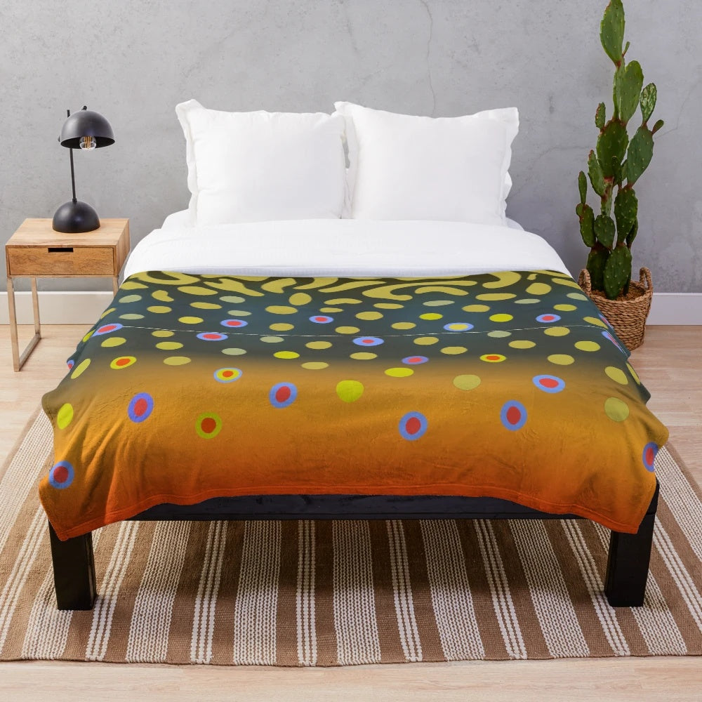 Brook trout inspired plush blanket with speckled pattern