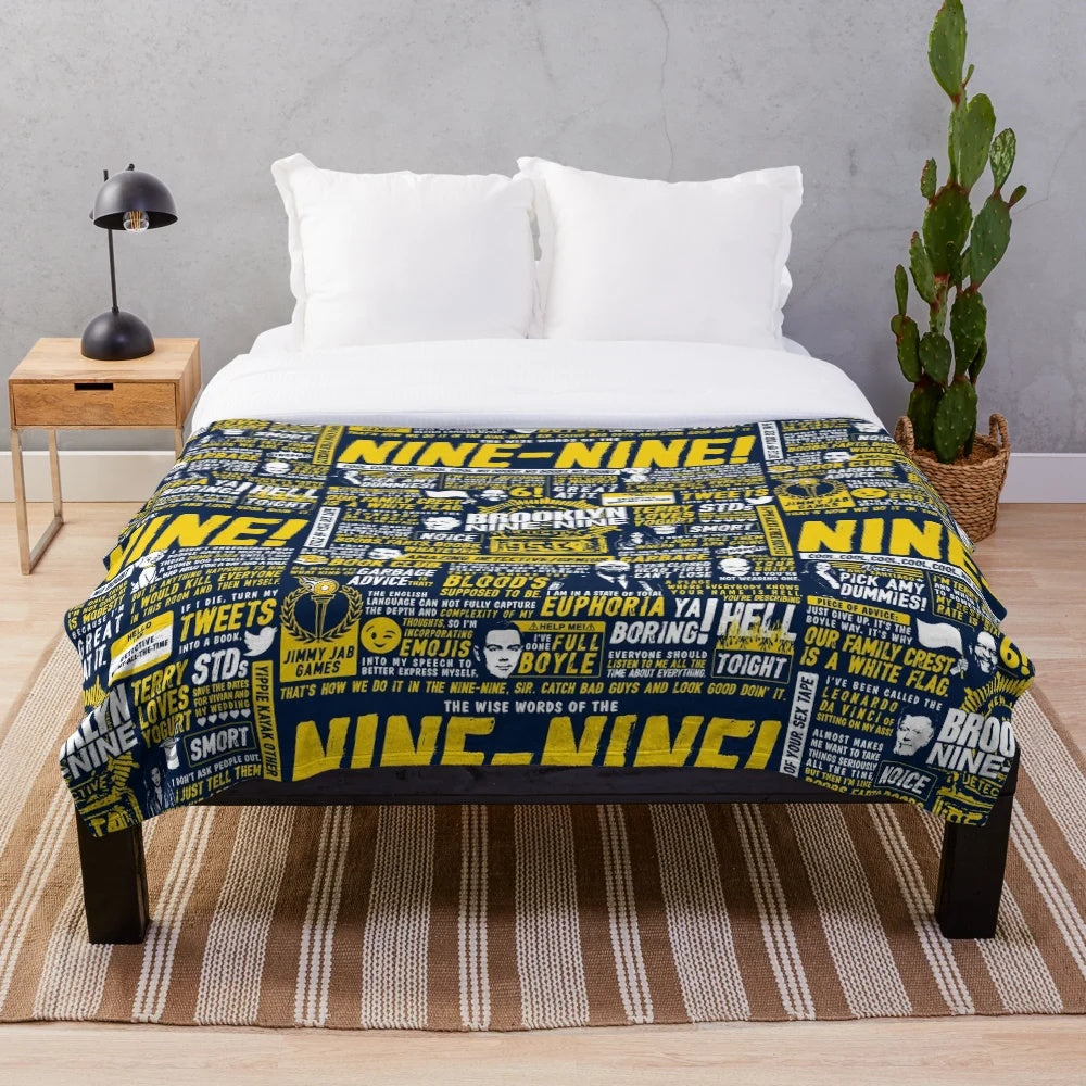 Brooklyn Nine-Nine inspired plush blanket with Nine-Nine logo and characters