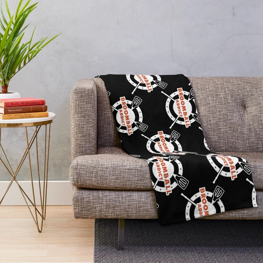Broomball lover enjoying a cozy plush blanket