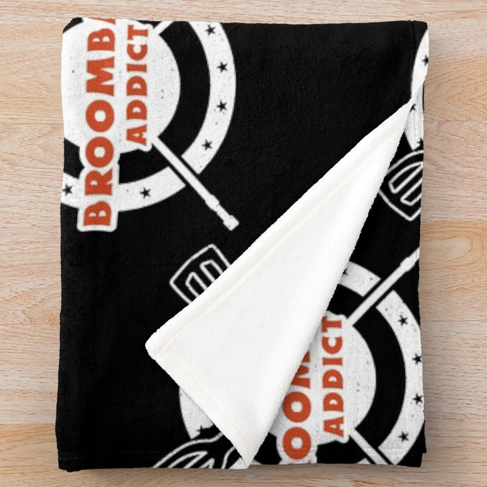 Broomball lover enjoying a cozy plush blanket