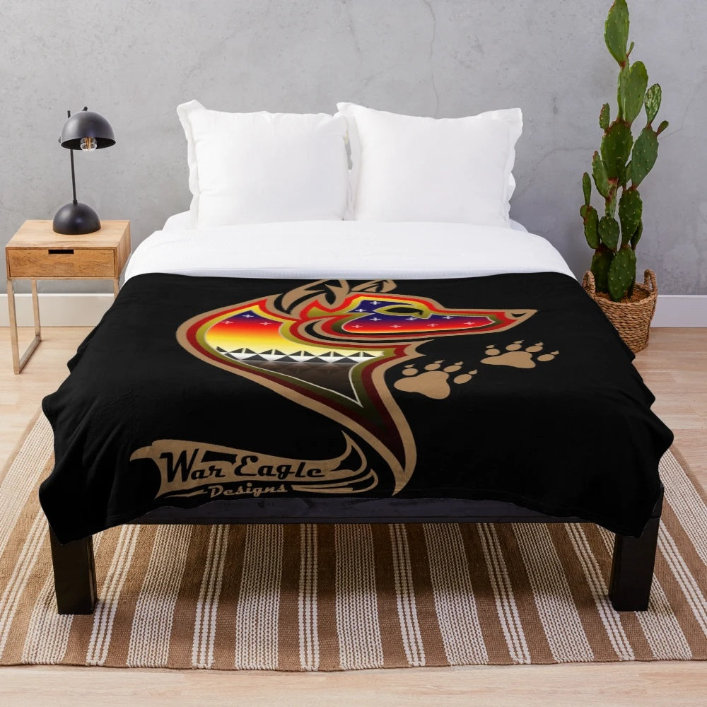 Brown wolf plush blanket featuring native american art and wildlife