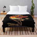 Brown wolf plush blanket featuring native american art and wildlife