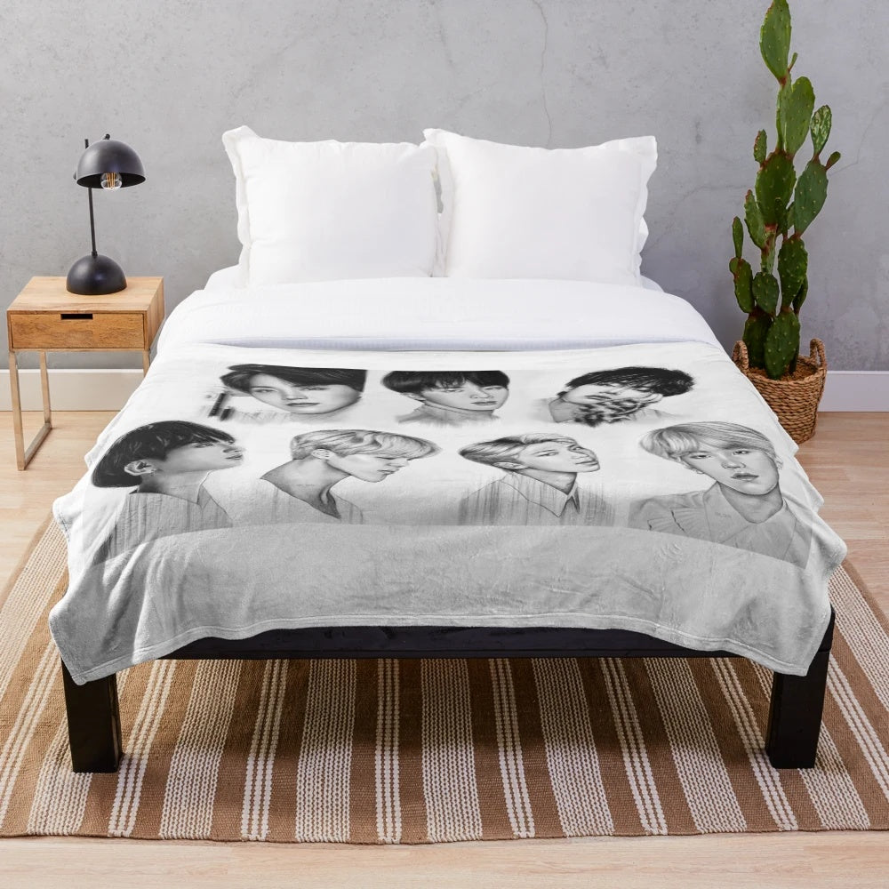 Plush blanket featuring a pencil drawing of the 7 members of the popular K-pop group BTS
