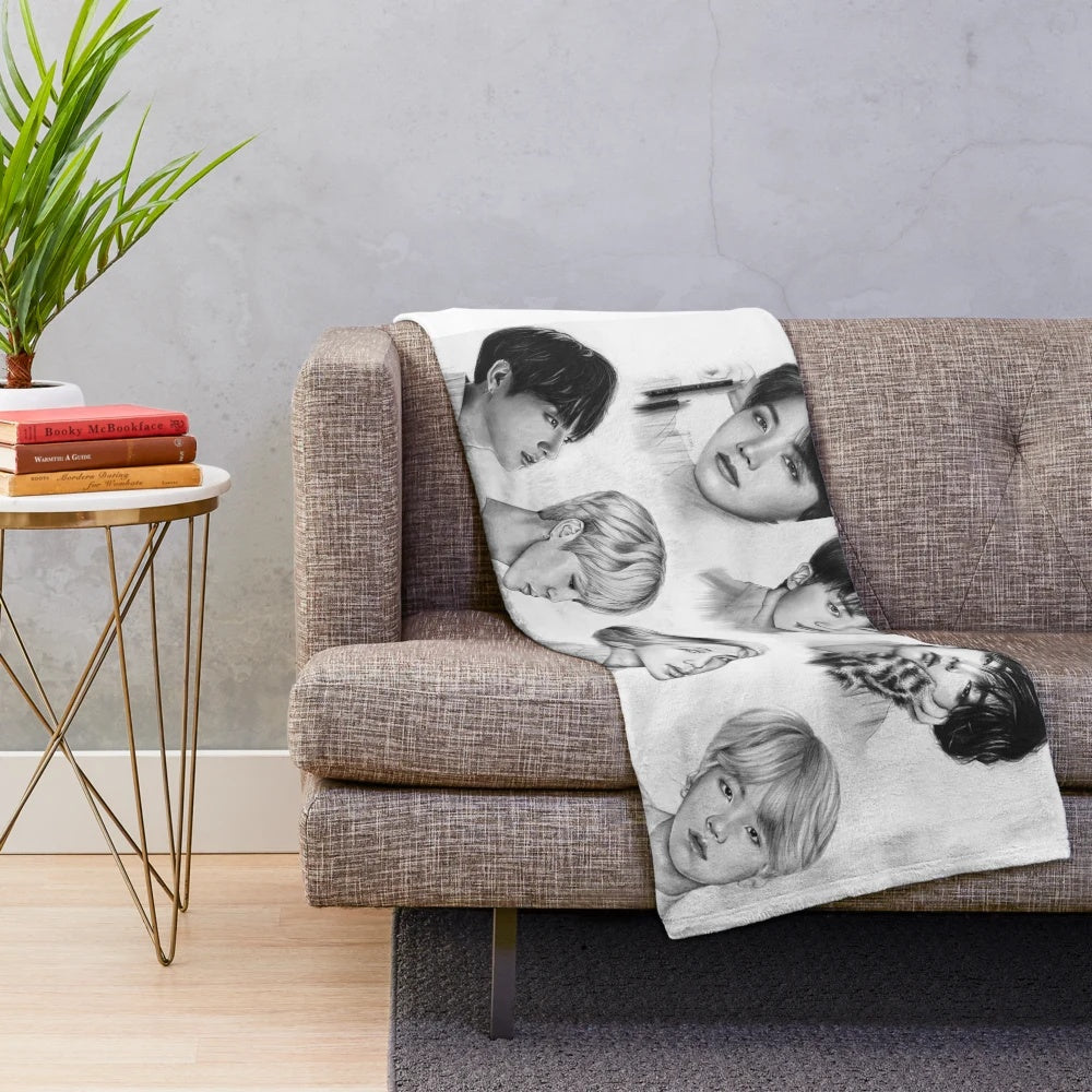 Plush blanket featuring a pencil drawing of the 7 members of the popular K-pop group BTS
