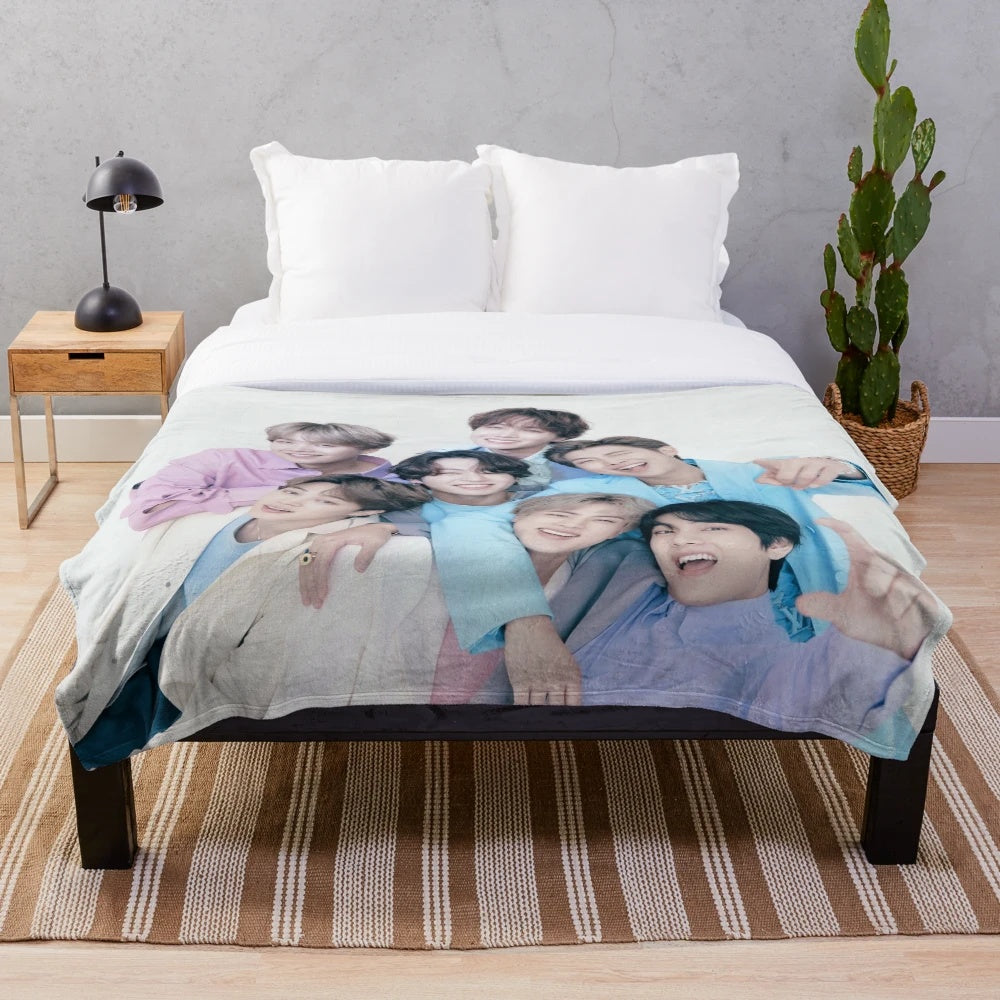 Cozy BTS plush blanket featuring the K-pop group