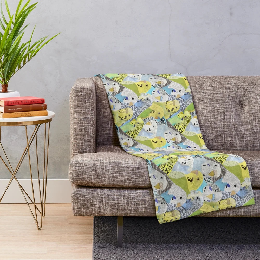 Cozy plush blanket featuring a charming budgie parakeet pattern design