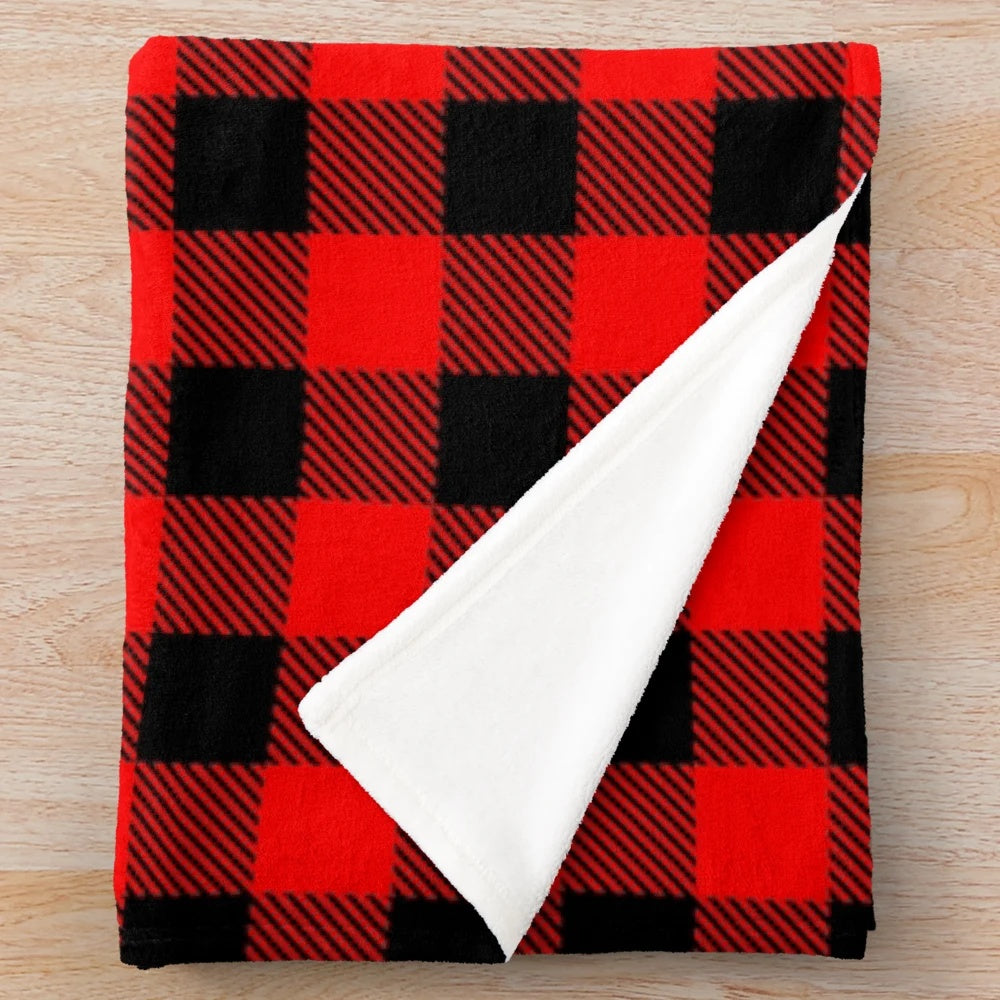 Buffalo check red and black plaid blanket with a lumberjack-inspired canadiana style