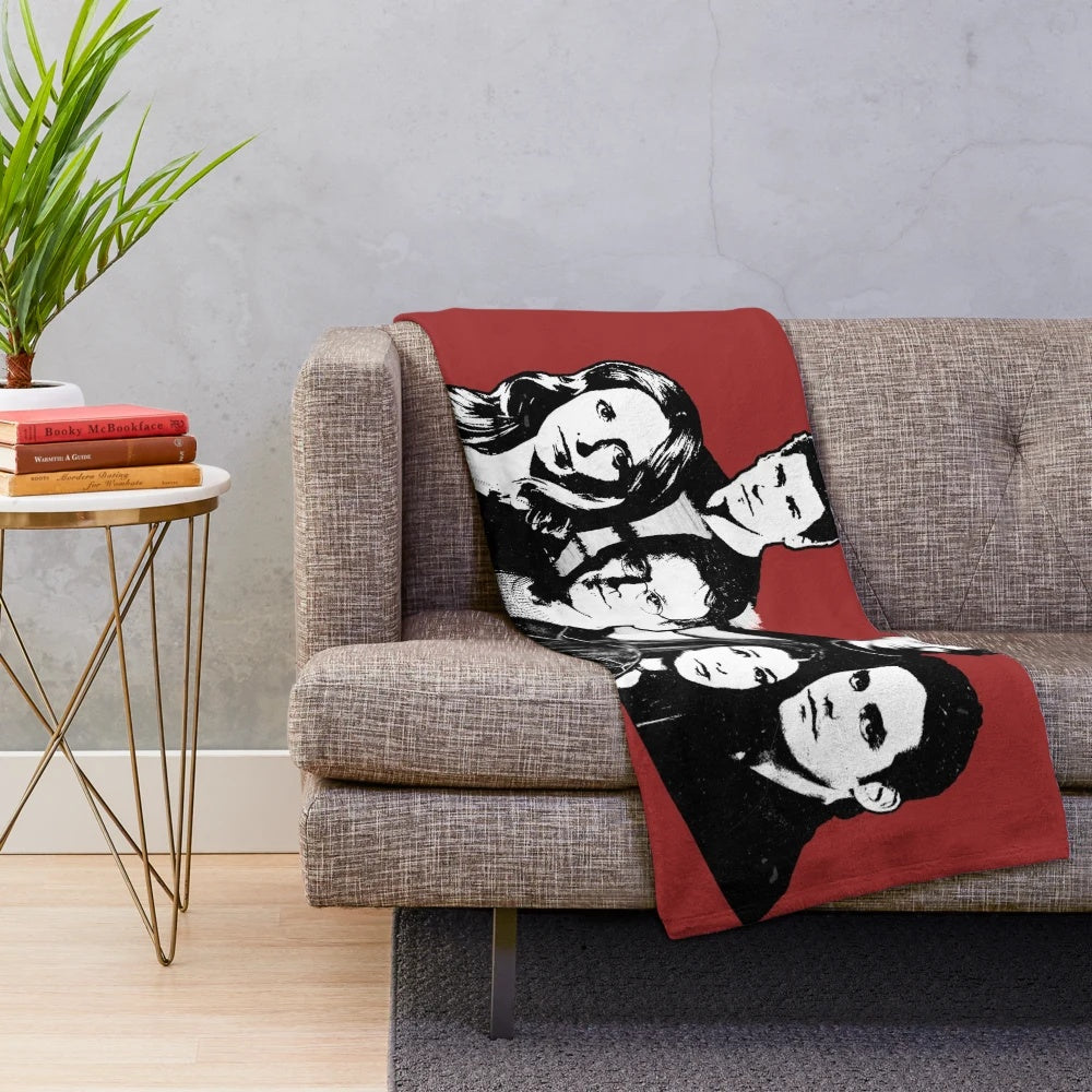 A cozy plush blanket featuring a Buffy the Vampire Slayer motif design