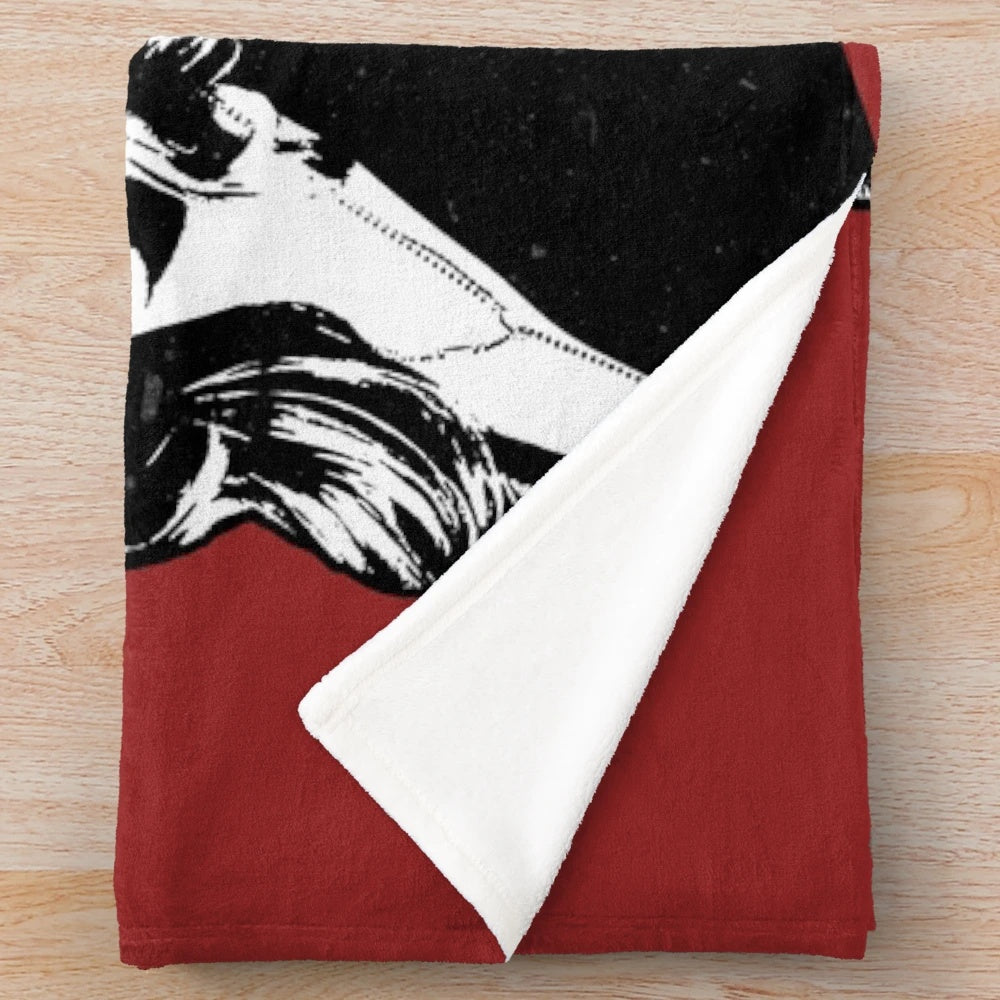 A cozy plush blanket featuring a Buffy the Vampire Slayer motif design
