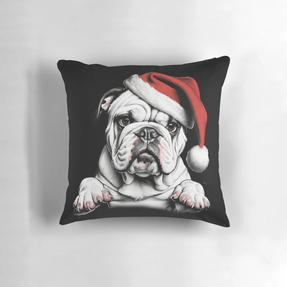 Adorable bulldog wearing a Santa hat on a plush Christmas-themed pillow